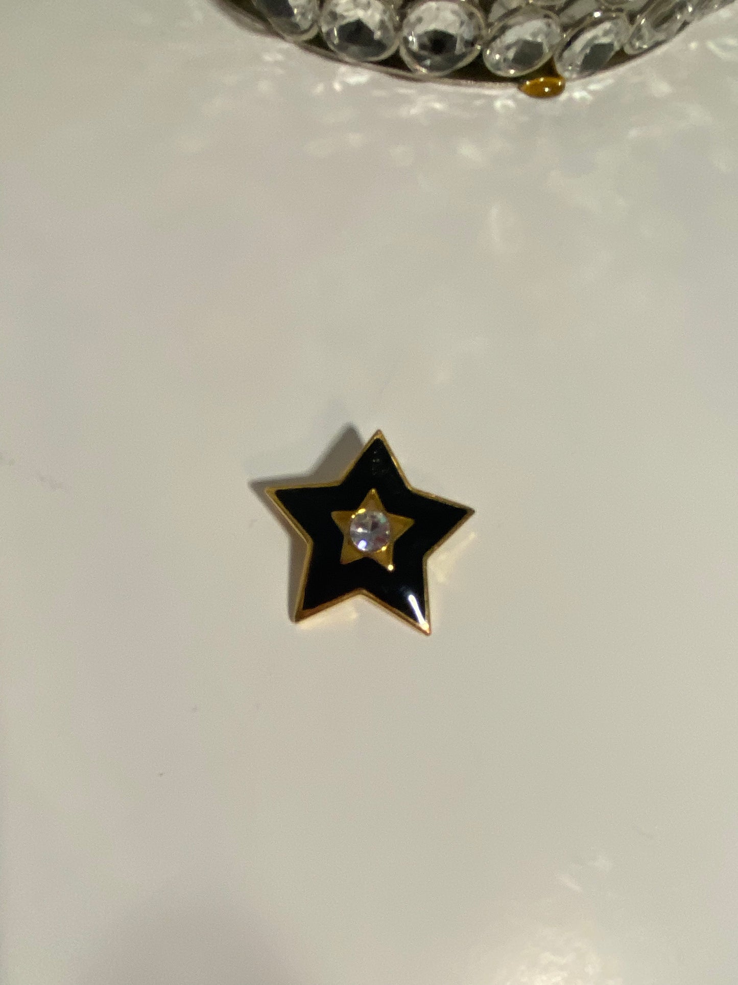 Black star brooch